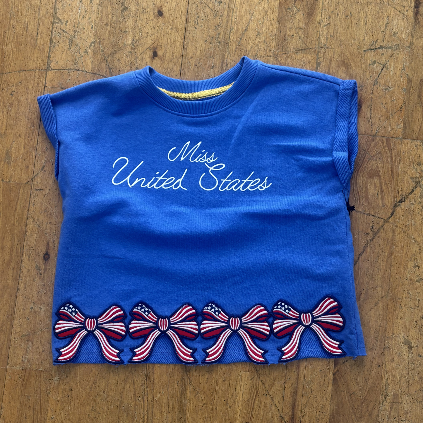 Miss United States bow patch hem dolman top
