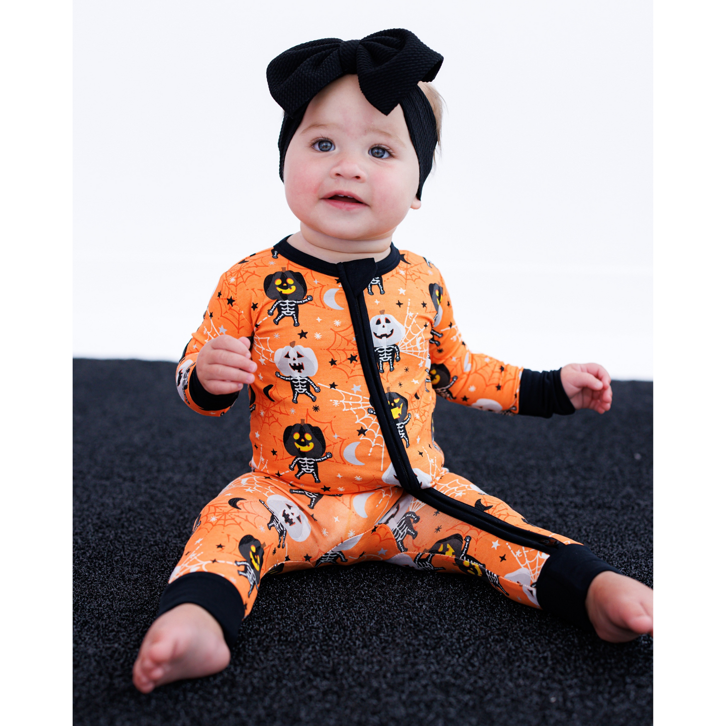 Michael glow in the dark conv. romper - jack skeletons