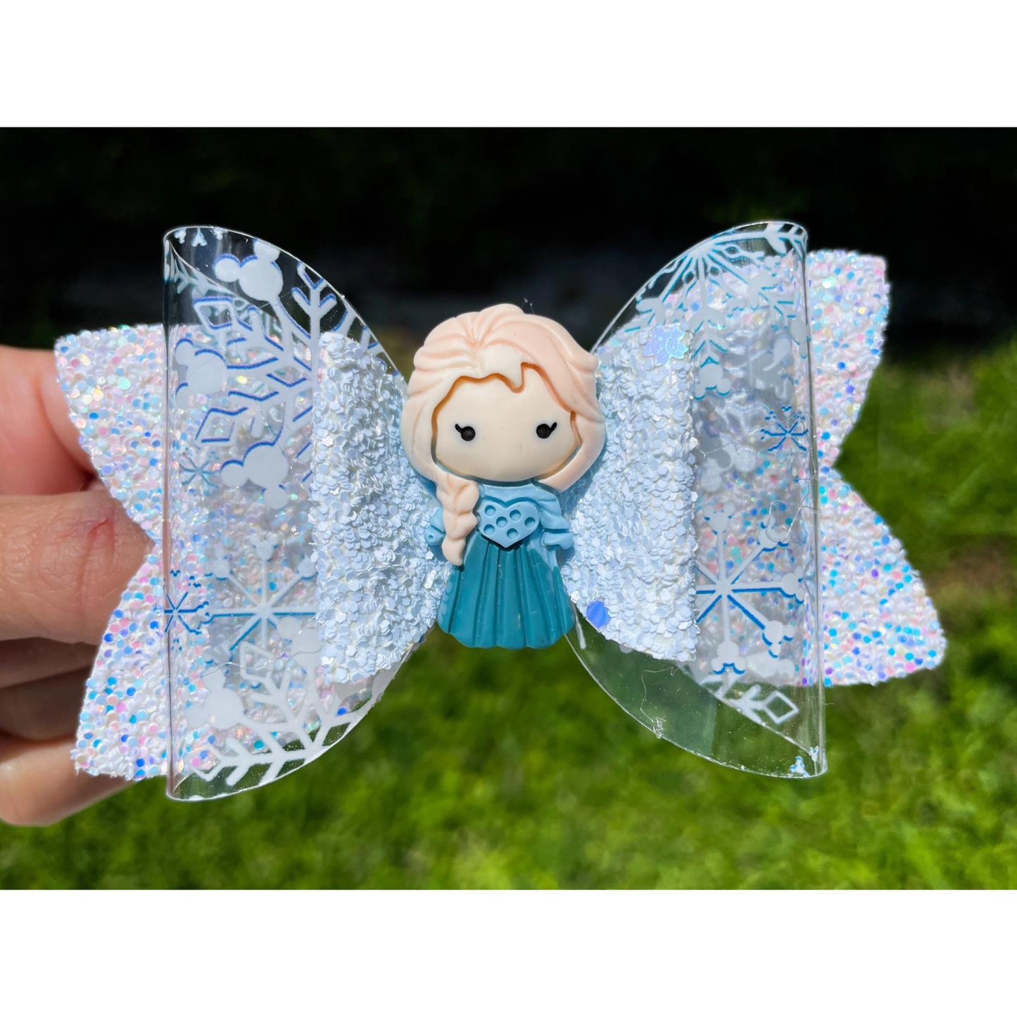 Blue snow princess faux leather hair bow