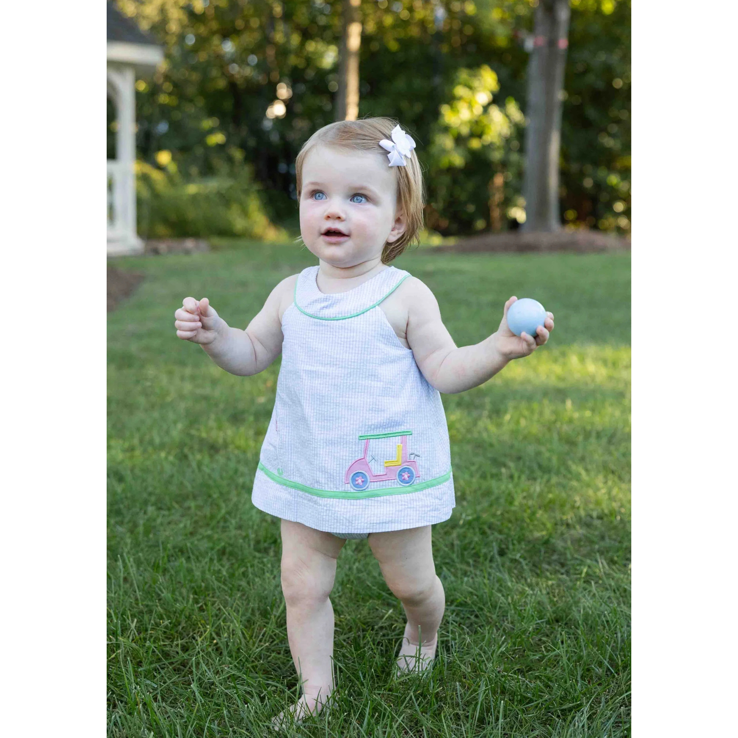 Golf cart check seersucker skirted romper