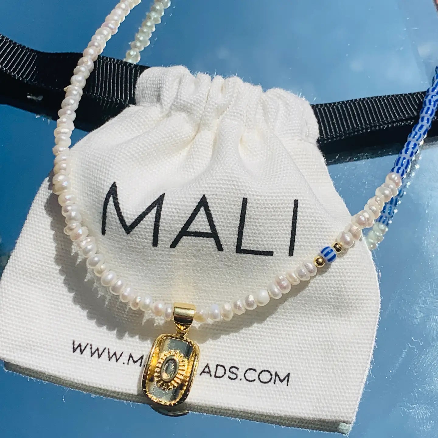 Coastal cowgirl hat necklace - pearl & blue