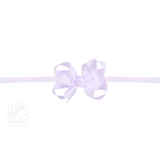 Pantyhose headband w. scalloped edge bow medium - powder orchid